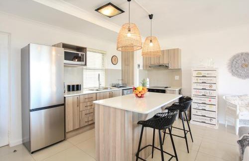 Big Bay Apartment | Designer Beachfront Apartment in Big Bay with swimming pool- 2 bedroom, 1 Azure