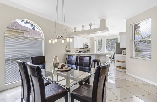 Central Naples House | Designer Lakefront Haven ‘