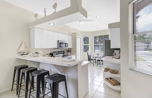 Central Naples House | Designer Lakefront Haven ‘