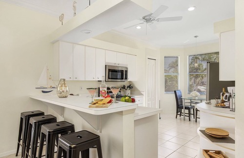 Central Naples House | Designer Lakefront Haven ‘
