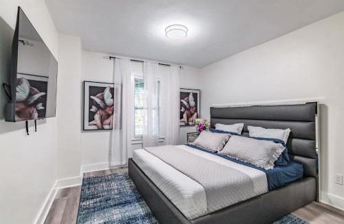 Crescent Lake Apartment | Designer Sun Filled Condo - Walk to Town