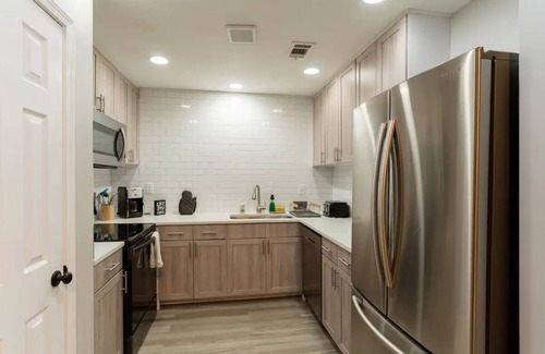 Cumming House | Desired premium location, minutes to everything!
