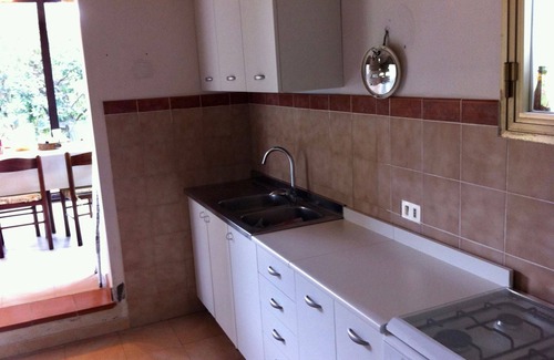Poveromo Apartment | Detached bungalow-style house at 25m from the beach with 2.000m2 of privat garden around it. Air con