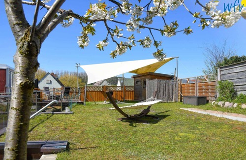 Seedorf House | Detached vacation home with sauna, garden, fireplace and modern furnishings in Se