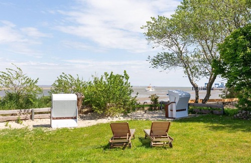 Wittduen Apartment | Die Wohnung Martha Wurde 2020 Komplett Renoviert und neu Eingerichtet . Sie Haben Einen Wunderschönen Blick in den Gepflegten Garten und auf das Wattenmeer