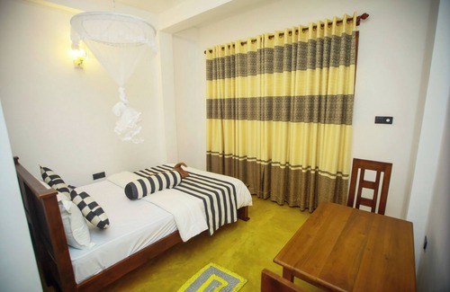 Ella House | Dinaro Guest