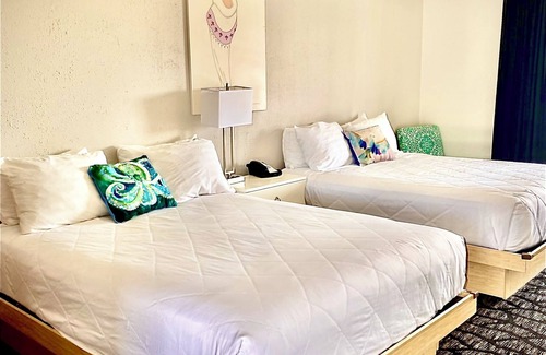 Cape May Hotel | Direct Beach access! 2 queen beds private balcony, plus an ocean to the left.