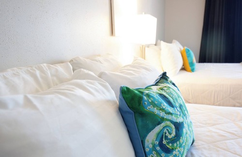 Cape May Hotel | Direct Beach access! 2 queen beds private balcony, plus an ocean to the left.