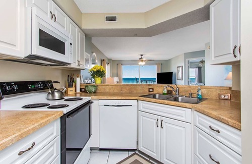 Seawinds Condo Condo | Direct oceanfront corner condo with large balcony, beachfront pool, and garage parking