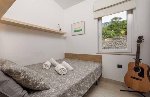 Grizane Cottage | Discover a cozy vacation home in Grižane, designed for up to four guests.