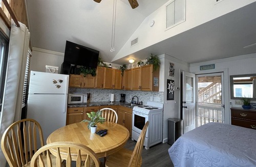 Hatteras Condo | Discover a hidden treasure at this unique, comfortable cabana Foolish Endeavor II!