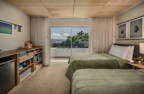 Historic Kailua Village Hotel | Discover a Stay with Built-in Island Calm: Pool, Yoga, Bikes & Explore Parks