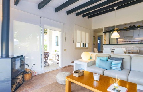Binisafua Villa | Discover Es Cantell, a villa steps from the beach and dining!