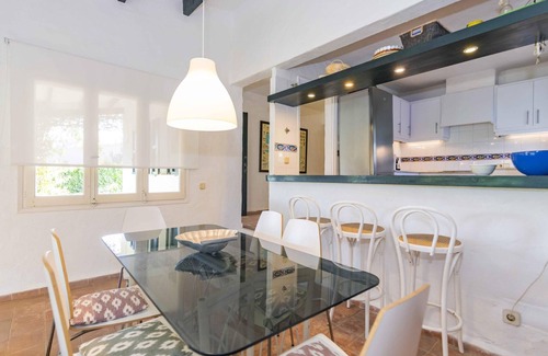 Binisafua Villa | Discover Es Cantell, a villa steps from the beach and dining!