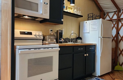 Rutherfordton House | Dog friendly 30' Yurt, large dome skylight, king bed, 2 bedrooms, sleeps 6.
