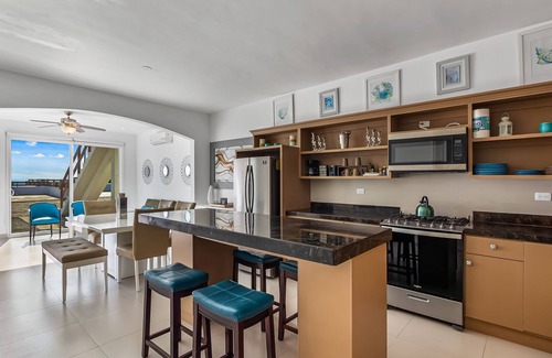 La Paloma House | Dog-friendly beachfront villa with pool & hot tub access plus rooftop deck