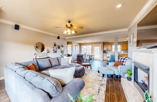 Bentonville House | Dog-friendly charmer with an enclosed yard, fireplace, jetted tub, W/D, and AC