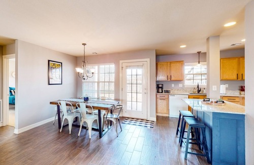 Bentonville House | Dog-friendly charmer with an enclosed yard, fireplace, jetted tub, W/D, and AC