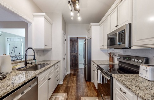Calabash House | Dog-friendly coastal home with lovely patio, pool, & games - near beaches & golf