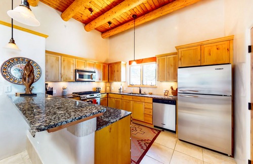 Tesuque Condo | Dog-friendly condo with kiva fireplaces, enclosed yard, & pool access