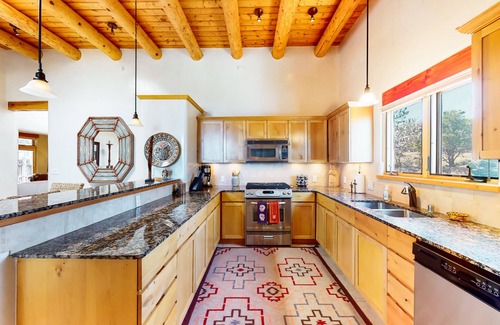 Tesuque Condo | Dog-friendly condo with kiva fireplaces, enclosed yard, & pool access