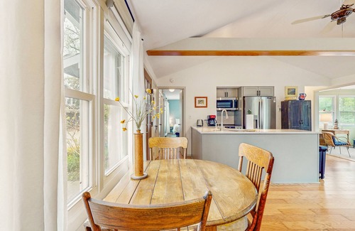 Lakeside House | Dog-friendly cottage with private beach, screened porch, wood fireplace & AC