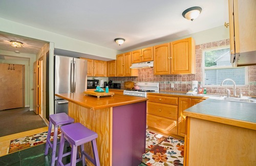 Empire House | Dog-friendly cottage with fenced yard, firepit, W/D, & WiFi - walkable location