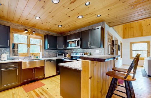 Cherry Log Cabin | Dog-friendly creekside cabin with a fireplace, firepit, AC, & washer/dryer