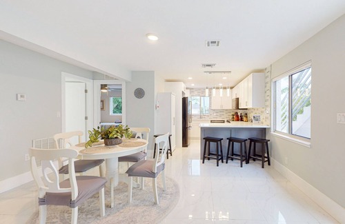 Isles of Capri House | Dog-friendly duplex with a patio, deck, washers, dryers, & central AC