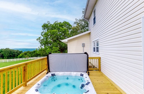 Trenton Cottage | Dog-friendly farmhouse with hot tub, private W/D, gas fireplace, and central AC