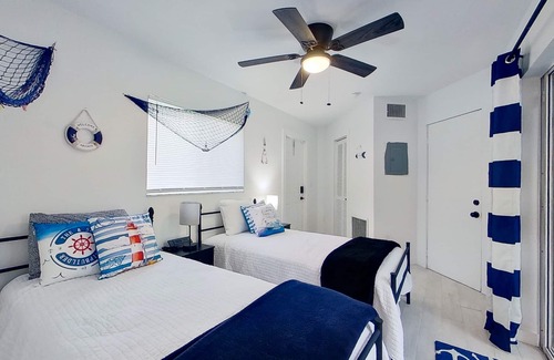 Fort Myers House | Dog-friendly home with private pool, dock, fireplace, patio, grill, & canal view