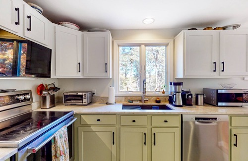 Truro House | Dog-friendly, hilltop home near the beach with hot tub, firepit & gorgeous porch