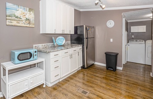 Shallotte House | Dog-friendly home in a prime location with a yard, patio, washer/dryer, and AC