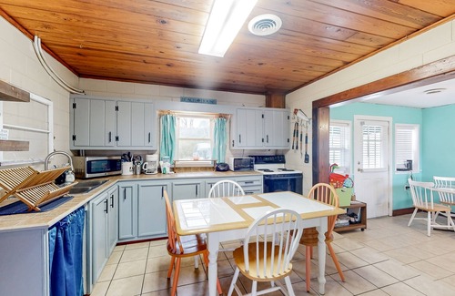 Morehead City House | Dog-friendly home near water with foosball, bikes, grill, outdoor shower, & W/D