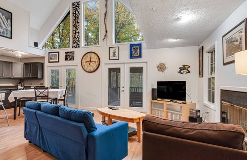 Mill Spring Cabin | Dog-friendly home with deck, shuffleboard, firepit - close to outdoor activities