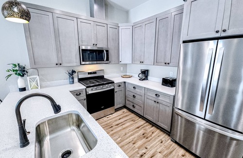 Port St. Joe House | Dog-friendly home with two full kitchens, balcony, AC, washers & dryers