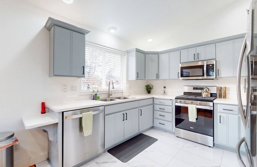 Mountain View District House | Dog-friendly home with hot tub, fenced patio, fireplace, & BBQ