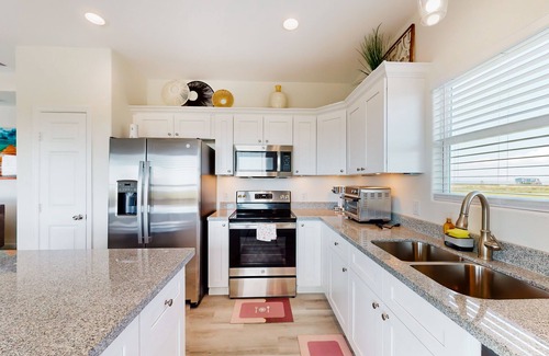Gilchrist House | Dog-friendly house in Gilchrist with expansive deck & water view