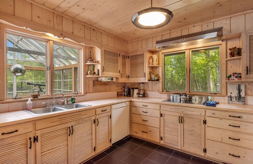 Land O Lakes House | Dog-friendly lakefront home with lake views, sauna, dock, firepit - near skiing