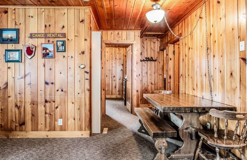 Presque Isle Cabin | Dog-friendly lakefront cabin with swimming, fishing, boating, & rec room