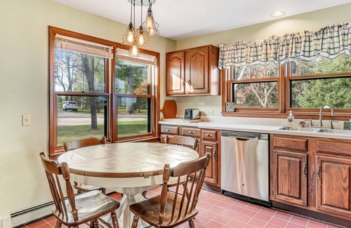Presque Isle House | Dog-friendly lakefront home with fireplace, porch, water access, & rec room