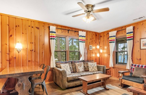 Presque Isle Cabin | Dog-friendly lakefront resort with swimming, fishing, boating, & rec room