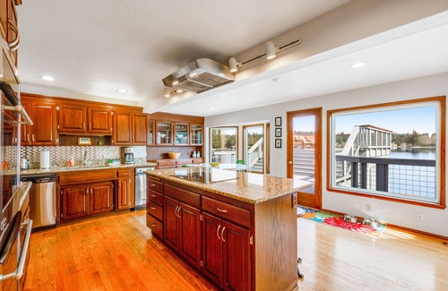 Clinton House | Dog-friendly, lakefront home with dock, deck and game room