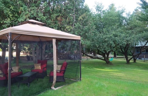 Ray Brook House | Dog Friendly, located Between Lake Placid and Saranac Lake with pontoon rentals