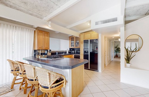 Palm Desert Condo | Dog-friendly mountain view condo with pool, grill, open layout, AC, & internet
