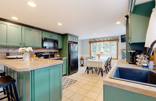 Gilmanton House | Dog-friendly retreat near the tranquil pond shore with spacious deck and dock