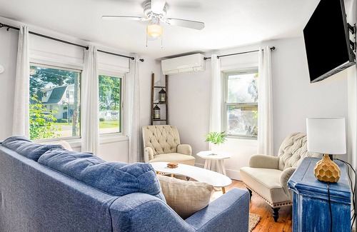 Paw Paw Lake House | Dog-friendly retreat near the lake with charming fixtures, large yard, & firepit