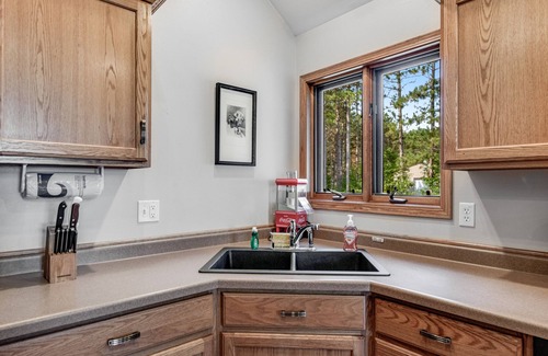 Necedah House | Dog-friendly riverfront retreat with huge yard, deck, grill, firepit, & kayaks