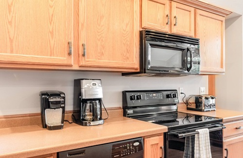 Necedah House | Dog-friendly riverfront retreat with huge yard, deck, grill, firepit, & kayaks