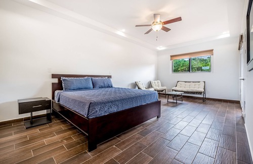 Villarreal Villa | Dog-friendly tropical villa with a pool, patio, balcony, & washer/dryer